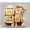Image 9 : A group of three ivory netsuke.