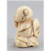 Image 10 : A group of two ivory netsuke of karako.