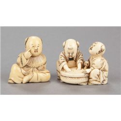 A group of two ivory netsuke of karako.