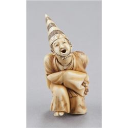 A ivory netsuke of a Sambaso dancer.