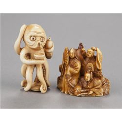 A group of two ivory netsuke.