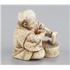 Image 5 : A group of two ivory netsuke.