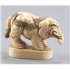 Image 1 : A ivory netsuke of an elephant.
