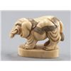 Image 4 : A ivory netsuke of an elephant.