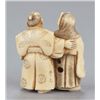 Image 4 : An ivory netsuke of the fox priest and village hea