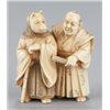 Image 6 : An ivory netsuke of the fox priest and village hea