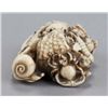 Image 4 : An ivory netsuke of a toad with insects.