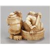Image 2 : A group of two ivory netsuke.