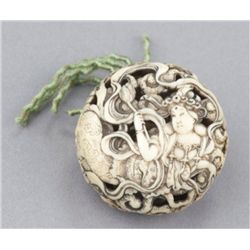 A walrus ivory ryusa manju of Tennin.