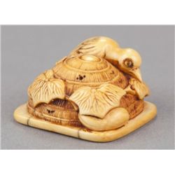 An ivory netsuke of a Cuckoo.
