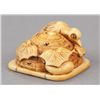 Image 1 : An ivory netsuke of a Cuckoo.