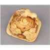 Image 7 : An ivory netsuke of a Cuckoo.