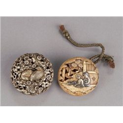 A group of two ivory ryusa manjus.