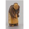 Image 1 : An ivory netsuke of a Chinese man.