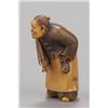 Image 2 : An ivory netsuke of a Chinese man.
