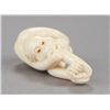 Image 1 : An ivory netsuke of a monkey.