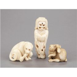 A group of three ivory netsuke.