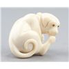 Image 2 : A group of three ivory netsuke.