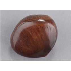 A wood netsuke of a chestnut.