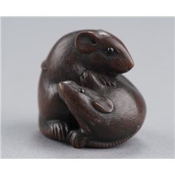 A wood netsuke of two Rats.