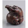 Image 2 : A wood netsuke of a tanuki.