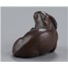 Image 4 : A wood netsuke of a rabbit.