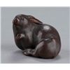 Image 5 : A wood netsuke of a rabbit.