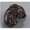 Image 6 : A wood netsuke of a rabbit.