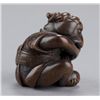 Image 2 : A wood netsuke of a monkey.