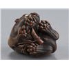Image 6 : A boxwood netsuke of a tiger and monkey.