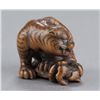 Image 2 : A wood netsuke of a tigress and cub.