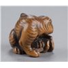 Image 3 : A wood netsuke of a tigress and cub.