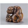 Image 5 : A wood netsuke of a tigress and cub.