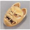Image 2 : An ivory netsuke of a Kitsune mask.