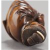 Image 7 : A wood netsuke of a maid.