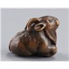 Image 3 : A wood netsuke of a goat.