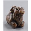 Image 4 : A wood netsuke of a goat.