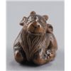 Image 5 : A wood netsuke of a goat.