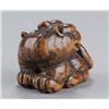 Image 2 : A wood netsuke of a tiger.
