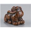 Image 3 : A wood netsuke of a tiger.
