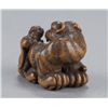 Image 3 : A wood netsuke of a tiger and cub.
