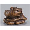 Image 4 : A wood netsuke of a tiger and cub.
