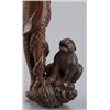 Image 8 : A boxwood netsuke of an octopus and monkey.