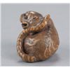 Image 4 : A wood netsuke of a tigress.