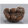 Image 5 : A wood netsuke of a tigress.