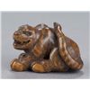 Image 2 : A wood netsuke of a tigress.
