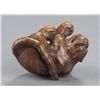 Image 7 : A wood netsuke of a tigress.