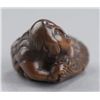 Image 5 : A wood netsuke of a ningyo.