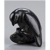 Image 1 : An ebony netsuke of an eagle catching a rabbit.