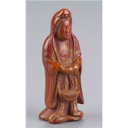 A guri lacquer netsuke of Kwannon.